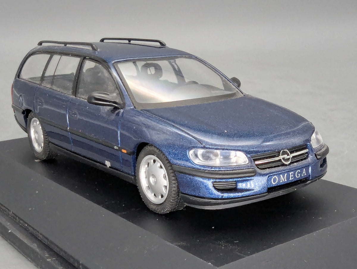 Modellautos 1:43 Schuco Opel Omega B Caravan 2,5 TD Blau Metallic mit OVP