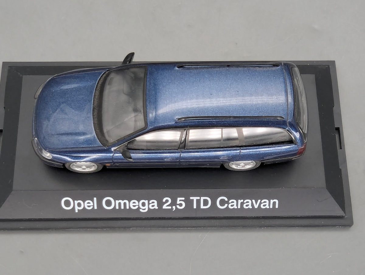 Modellautos 1:43 Schuco Opel Omega B Caravan 2,5 TD Blau Metallic mit OVP