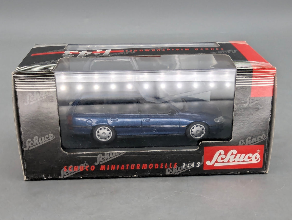 Modellautos 1:43 Schuco Opel Omega B Caravan 2,5 TD Blau Metallic mit OVP