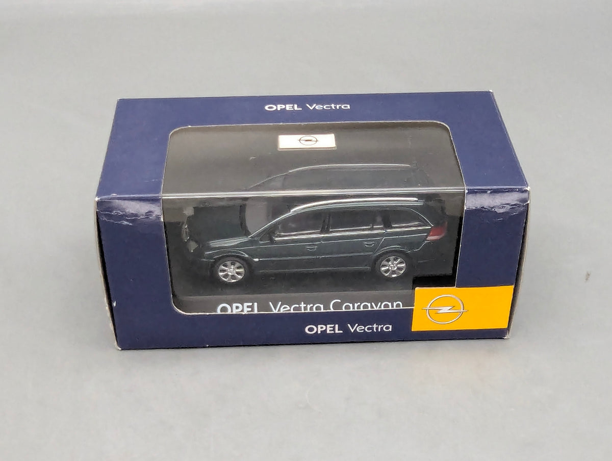 Modellautos 1:43 Schuco Opel Vectra Caravan Dunkelgrün Metallic mit Dealer OVP