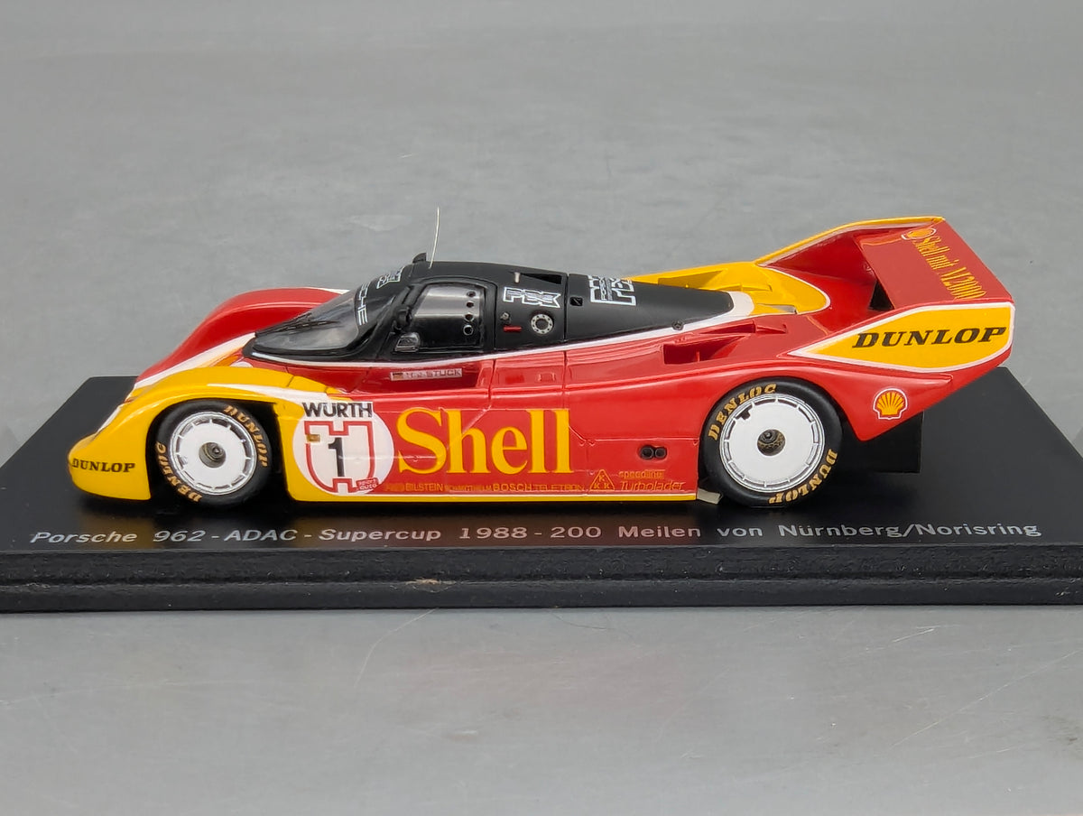 Modellautos 1:43 Spark SAM057 Porsche 962 ADAC Supercup 1988 #1 H. J. Stuck OVP