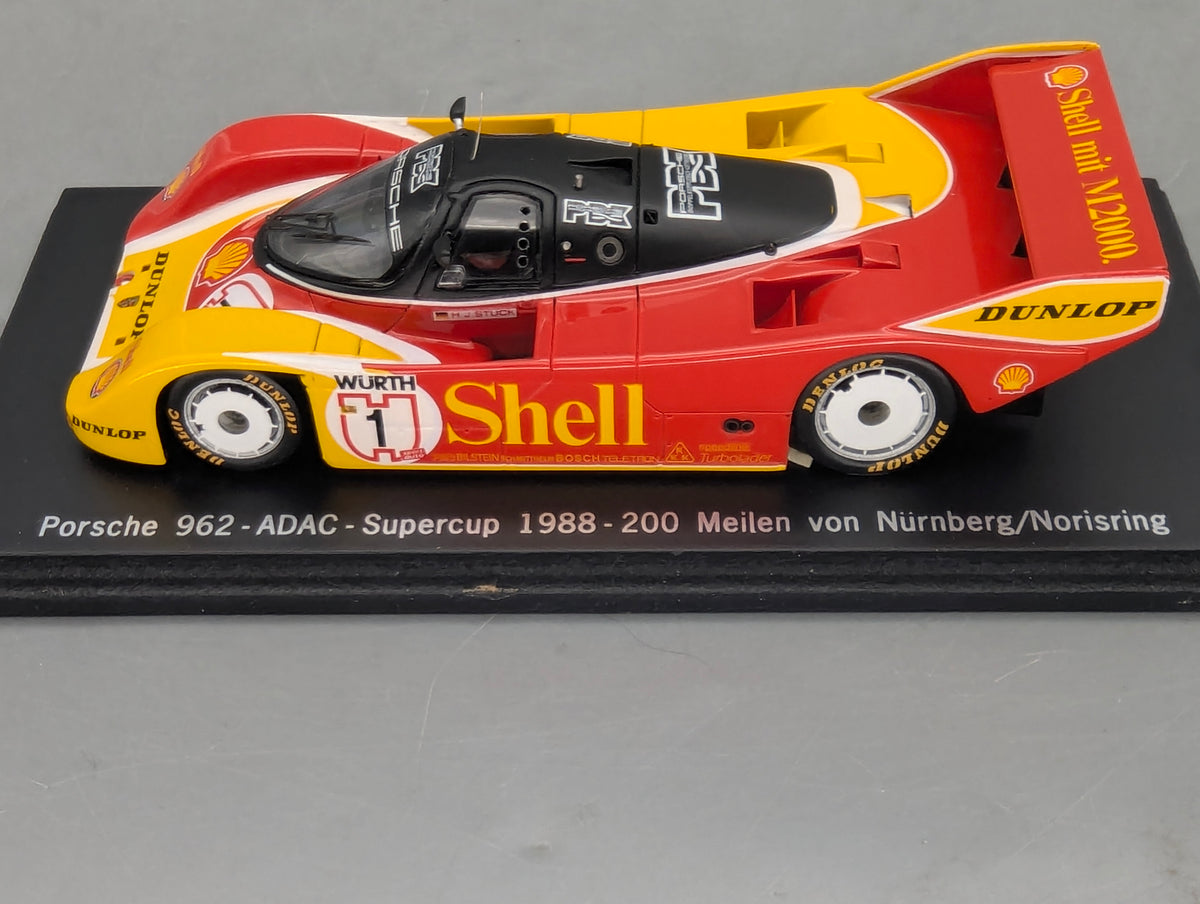 Modellautos 1:43 Spark SAM057 Porsche 962 ADAC Supercup 1988 #1 H. J. Stuck OVP