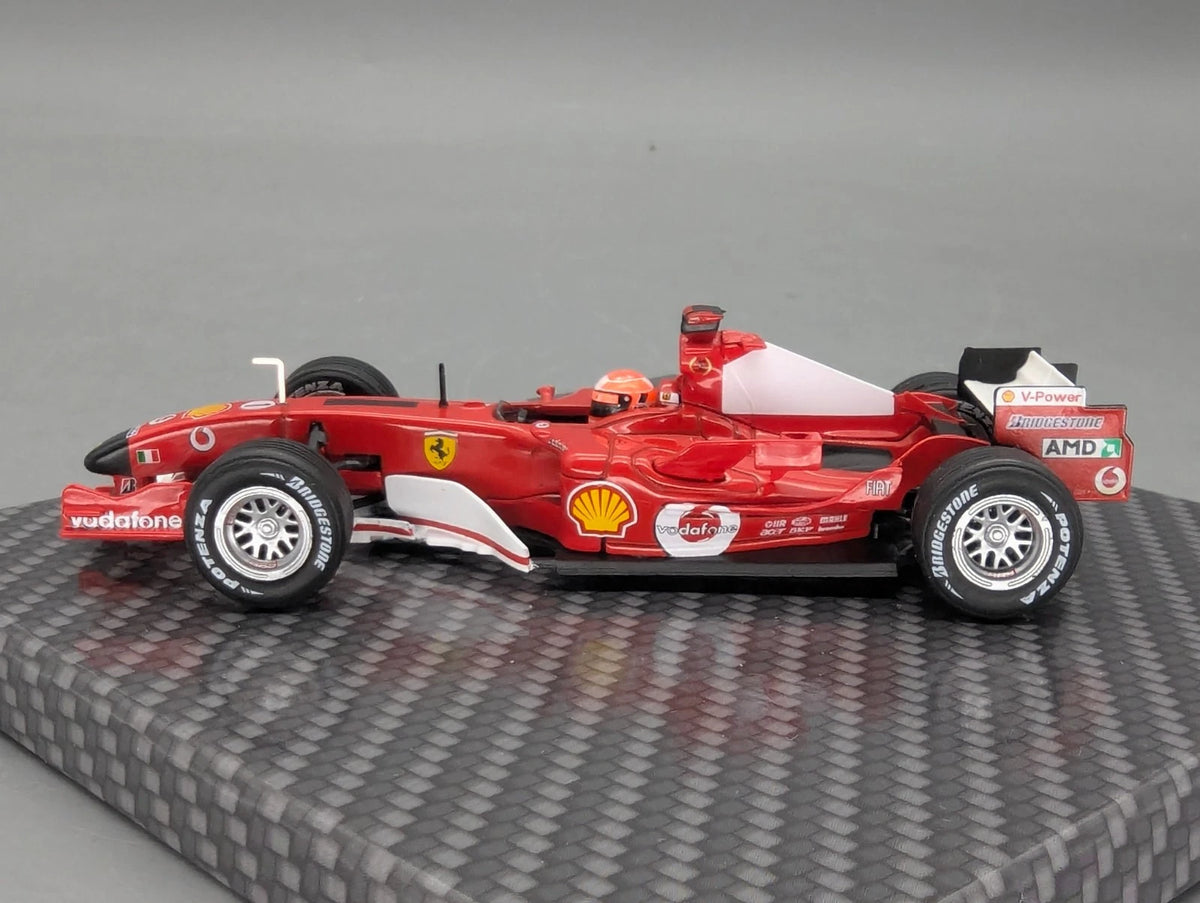 Modellautos 1:43 Ixo Ferrari F2005 #1 Michael Schumacher mit Klappbox OVP