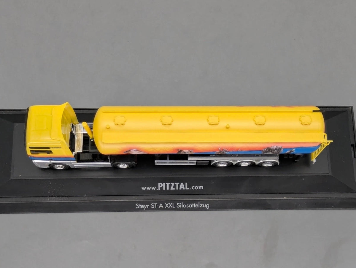 Lkw Modell 1:87 Herpa Steyr ST-A XXL Silosattelzug Pitztal mit Vitrine
