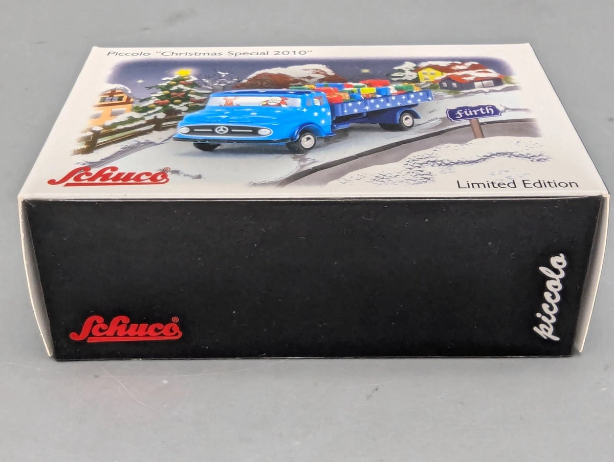 Modellautos 1:90 Schuco Piccolo Christmas Special Weihnachten 2010 MB LKW in OVP