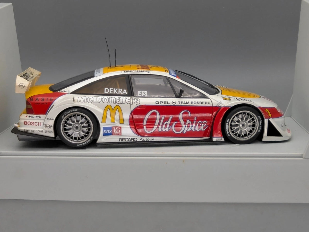 Modellautos 1:18 UT Models Opel Calibra Rosberg 1996 J. J. Letho in OVP