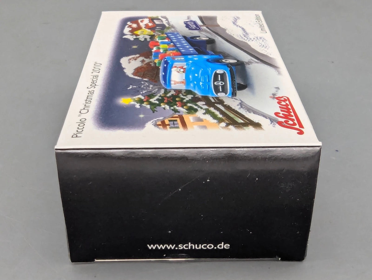 Modellautos 1:90 Schuco Piccolo Christmas Special Weihnachten 2010 MB LKW in OVP
