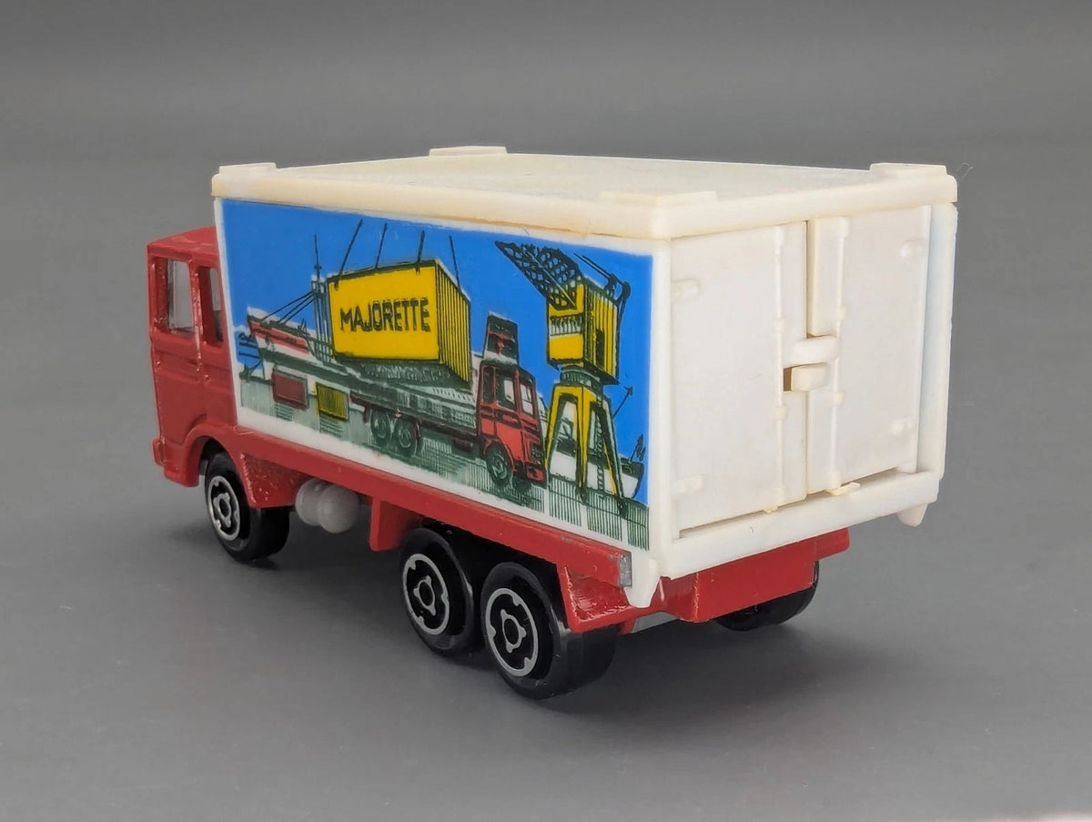 Modellautos 1:100 Majorette 214 Saviem Container + Original Majorette Vitrine
