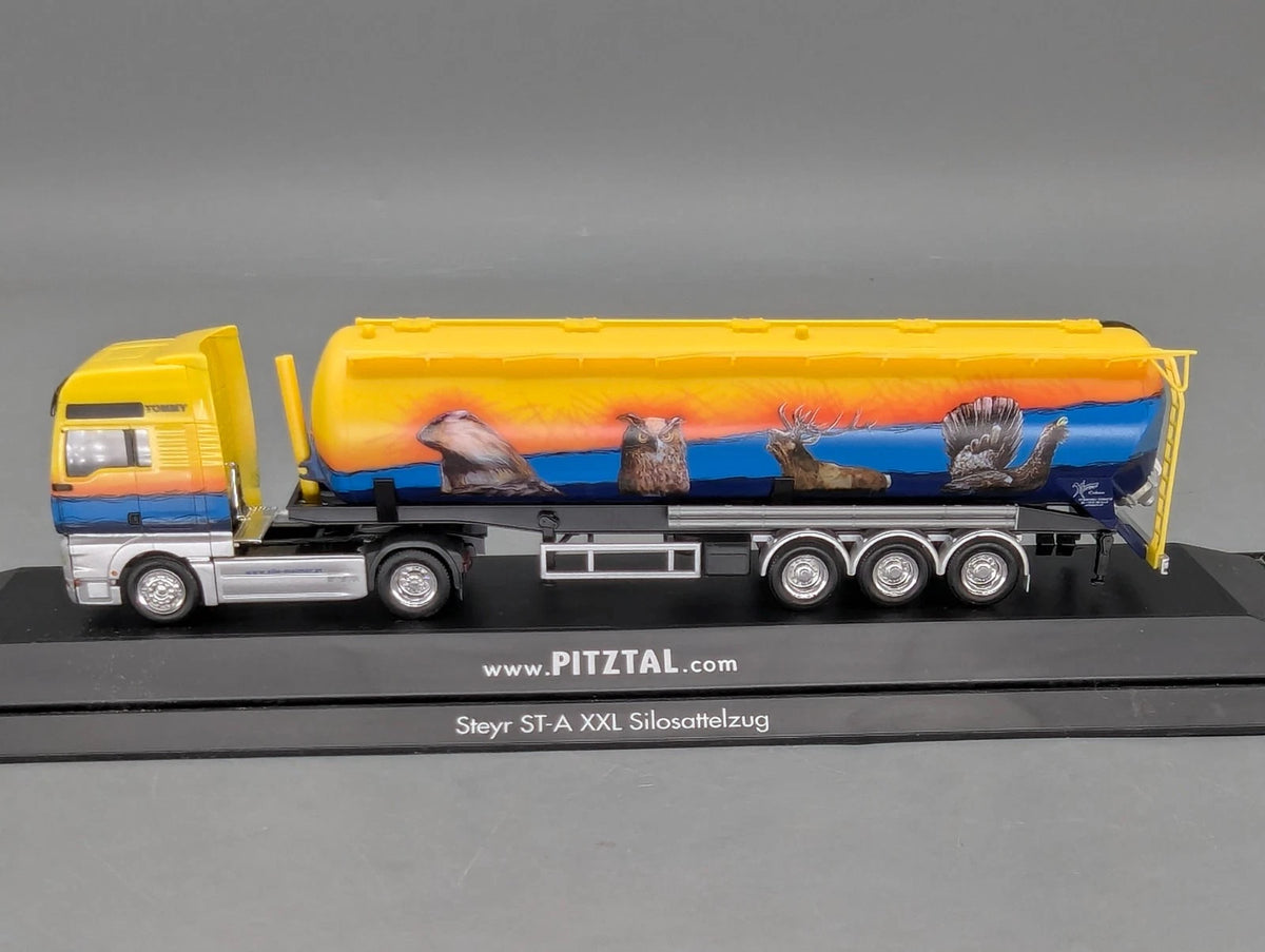 Lkw Modell 1:87 Herpa Steyr ST-A XXL Silosattelzug Pitztal mit Vitrine
