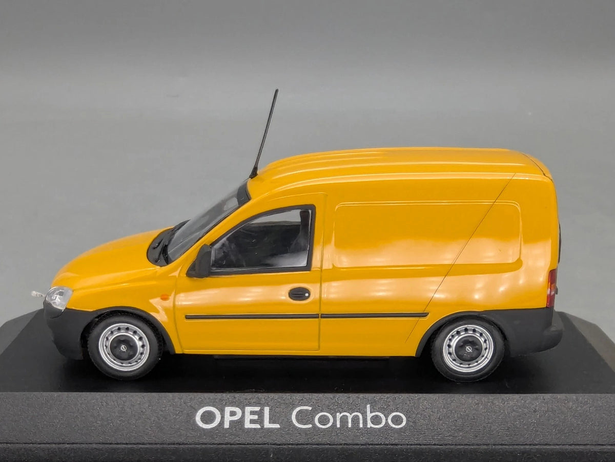 Modellautos 1:43 Minichamps Opel Combo gelb mit Dealer OVP