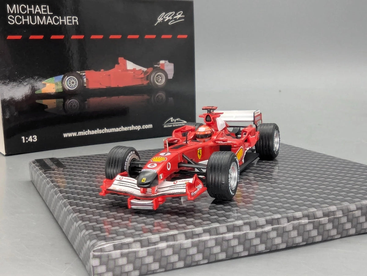 Modellautos 1:43 Ixo Ferrari F2005 #1 Michael Schumacher mit Klappbox OVP