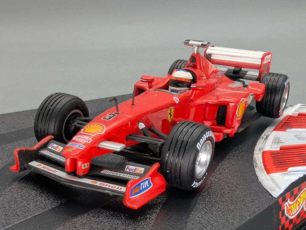 Modellautos 1:43 Hot Wheels Racing Ferrari F399 1999 #3 Schumacher mit OVP