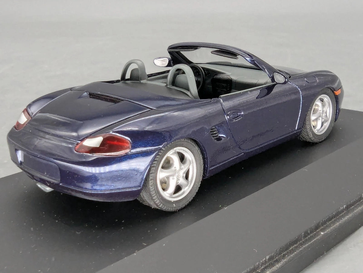 Modellautos 1:43 Schuco Porsche Boxter Blau Metallic mit Vitrine