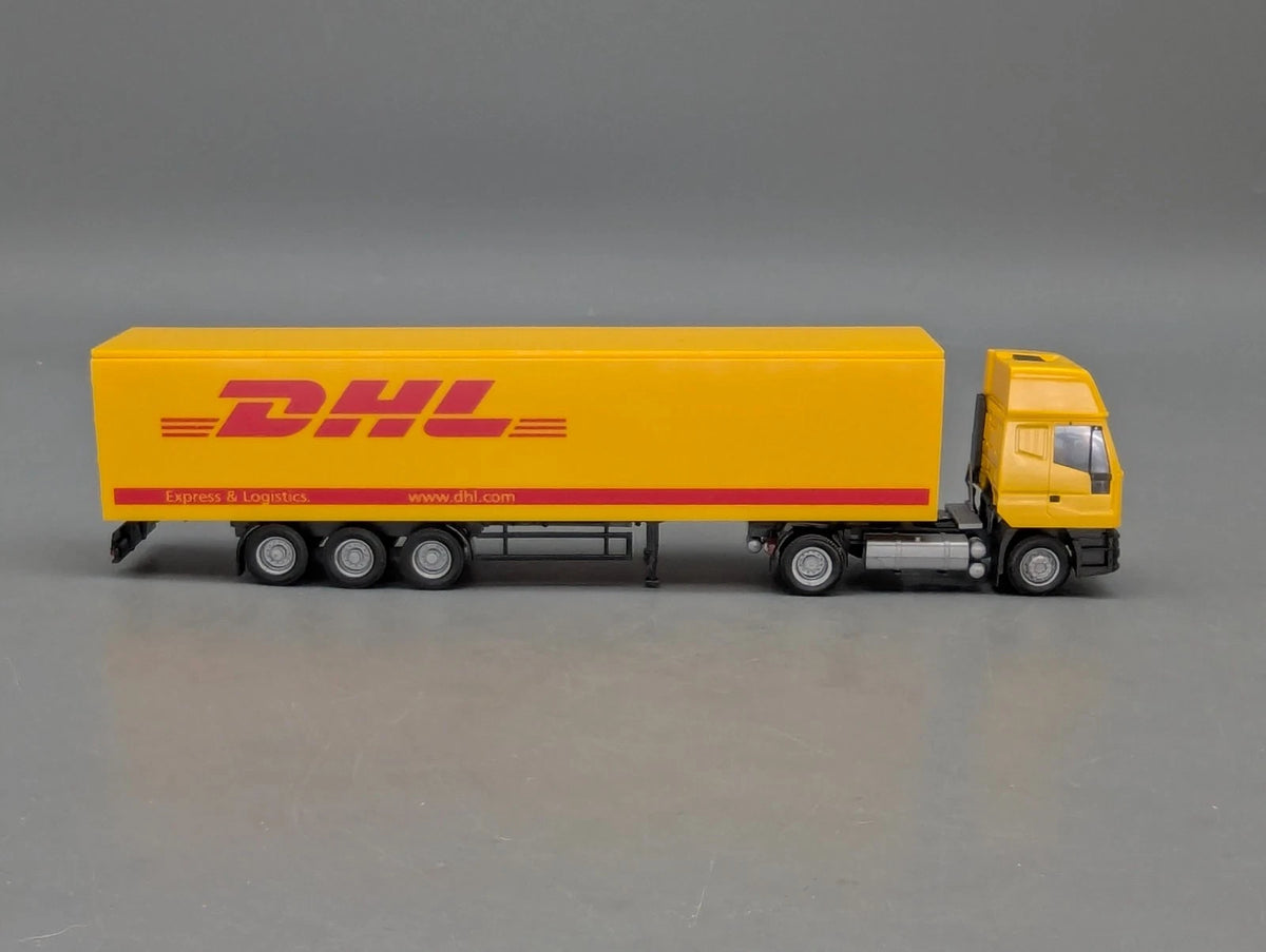 Lkw Modell 1:87 Rietze Iveco Eurostar Sattelzug DHL in Vitrine mit OVP