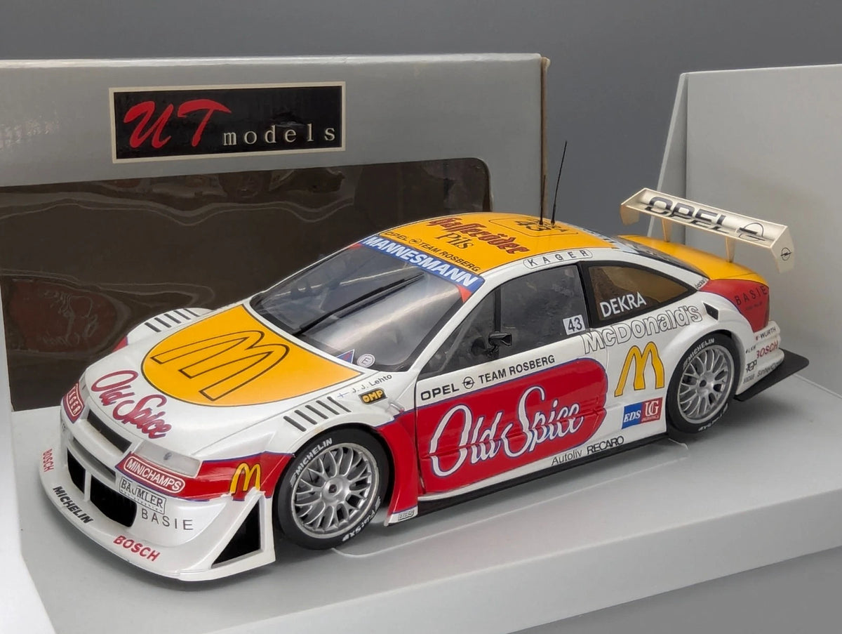 Modellautos 1:18 UT Models Opel Calibra Rosberg 1996 J. J. Letho in OVP