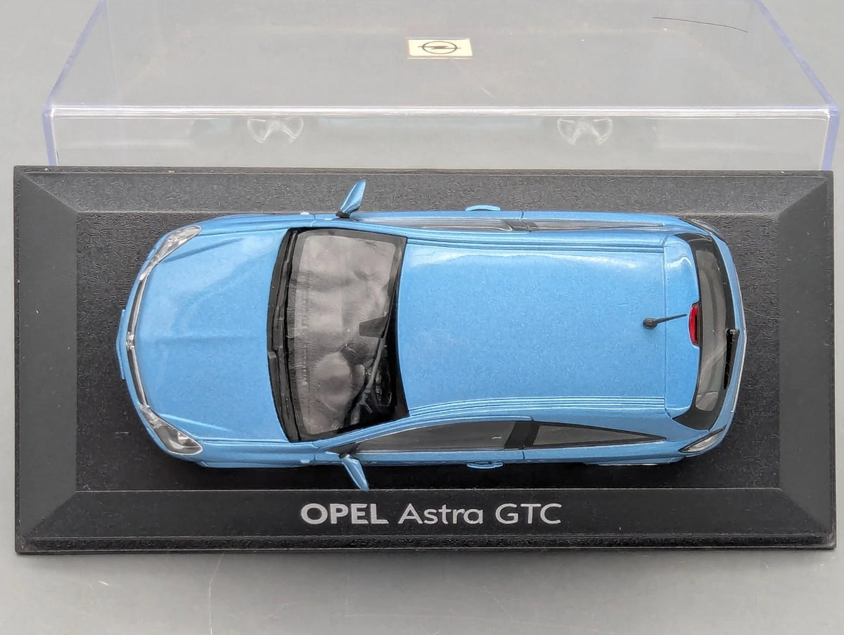 Modellautos 1:43 Minichamps Opel Astra GTC Blau Metallic mit Dealer OVP