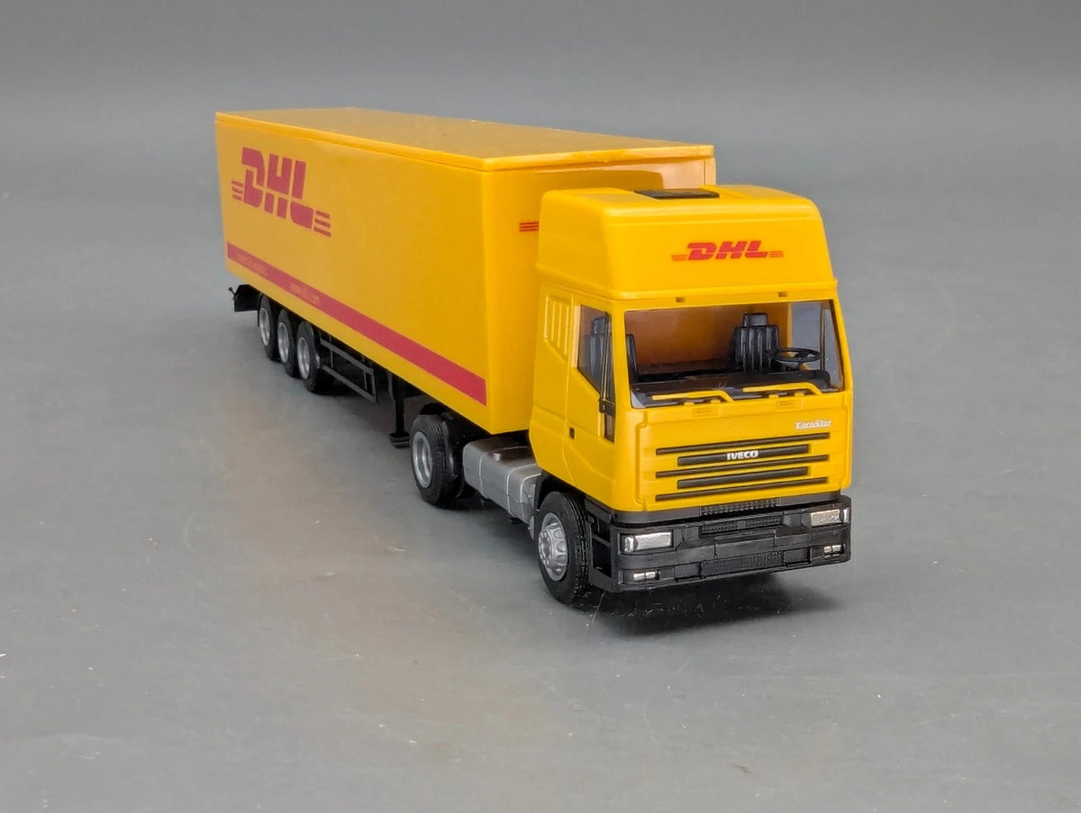 Lkw Modell 1:87 Rietze Iveco Eurostar Sattelzug DHL in Vitrine mit OVP