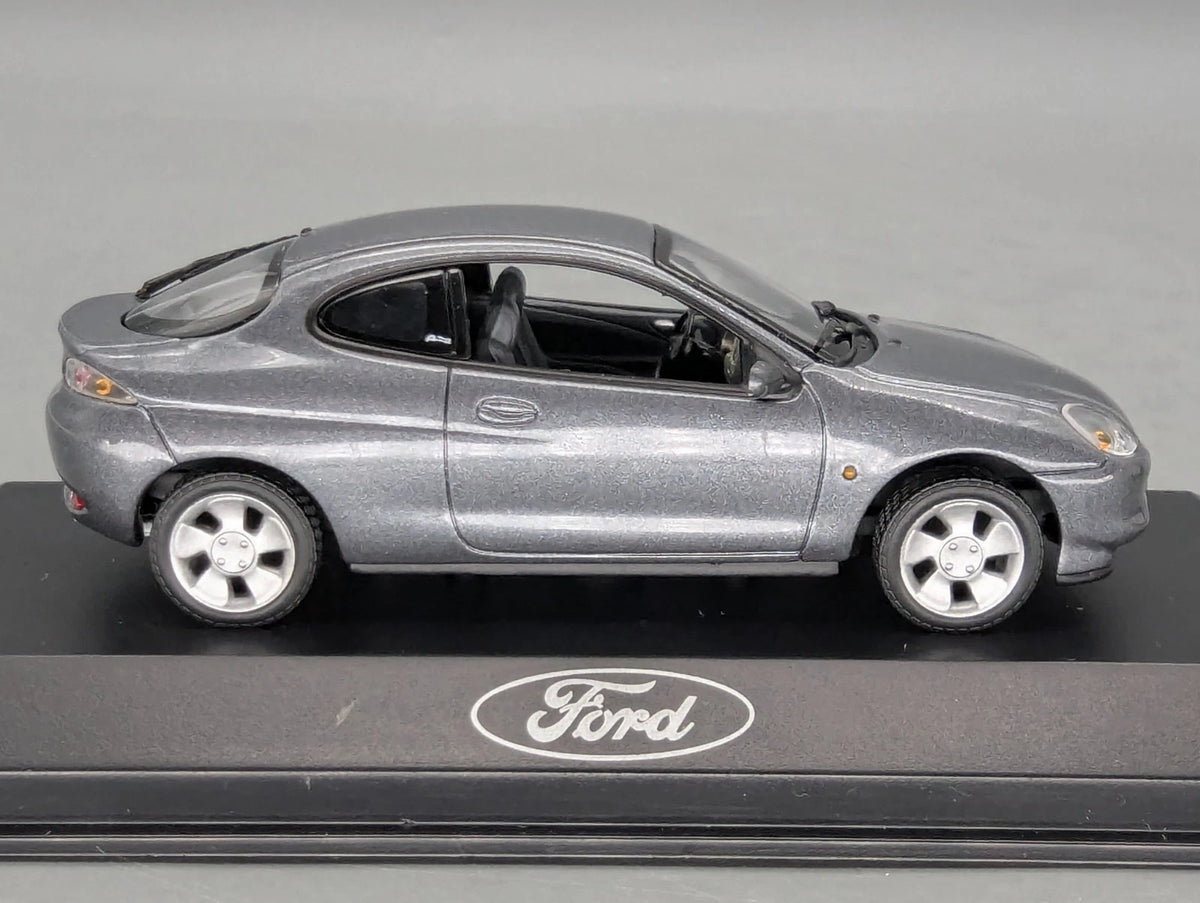Modellautos 1:43 Minichamps Ford Puma Silbergrau Metallic mit Dealer OVP