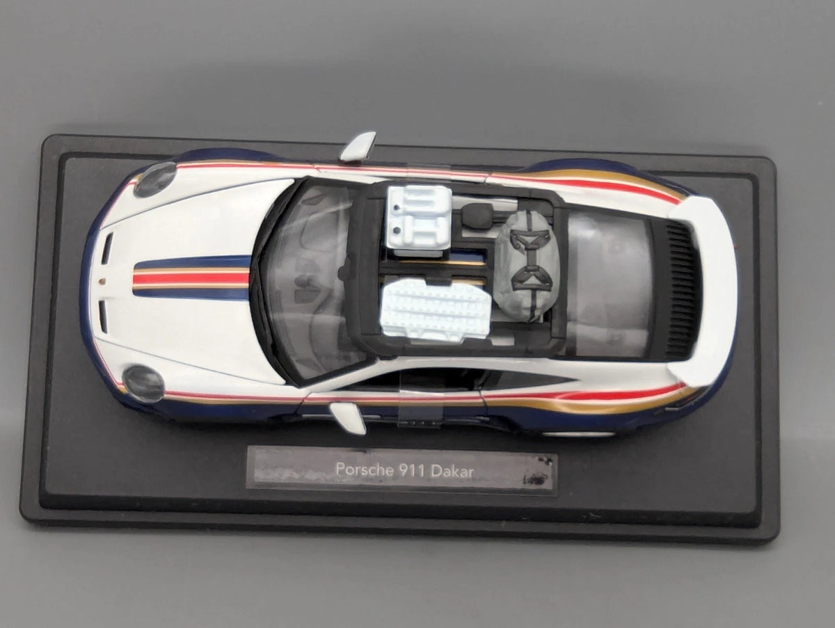 Modellautos 1:24 Bburago Porsche 911 Dakar mit Dealer OVP