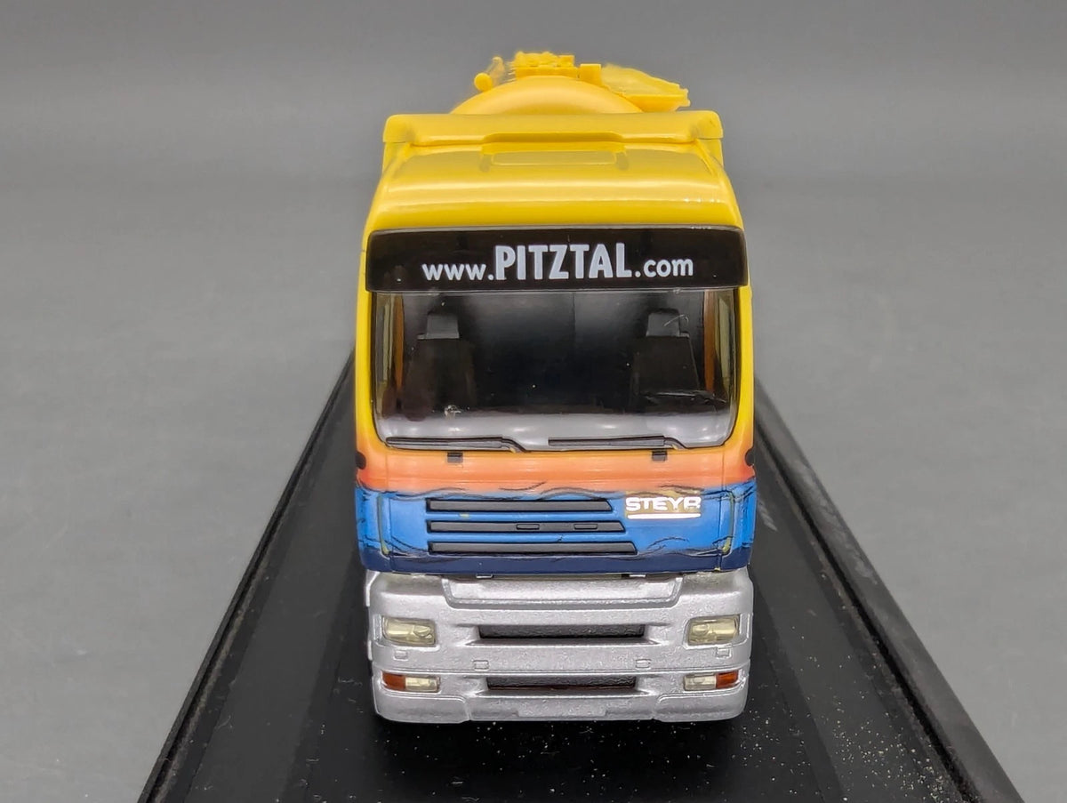 Lkw Modell 1:87 Herpa Steyr ST-A XXL Silosattelzug Pitztal mit Vitrine