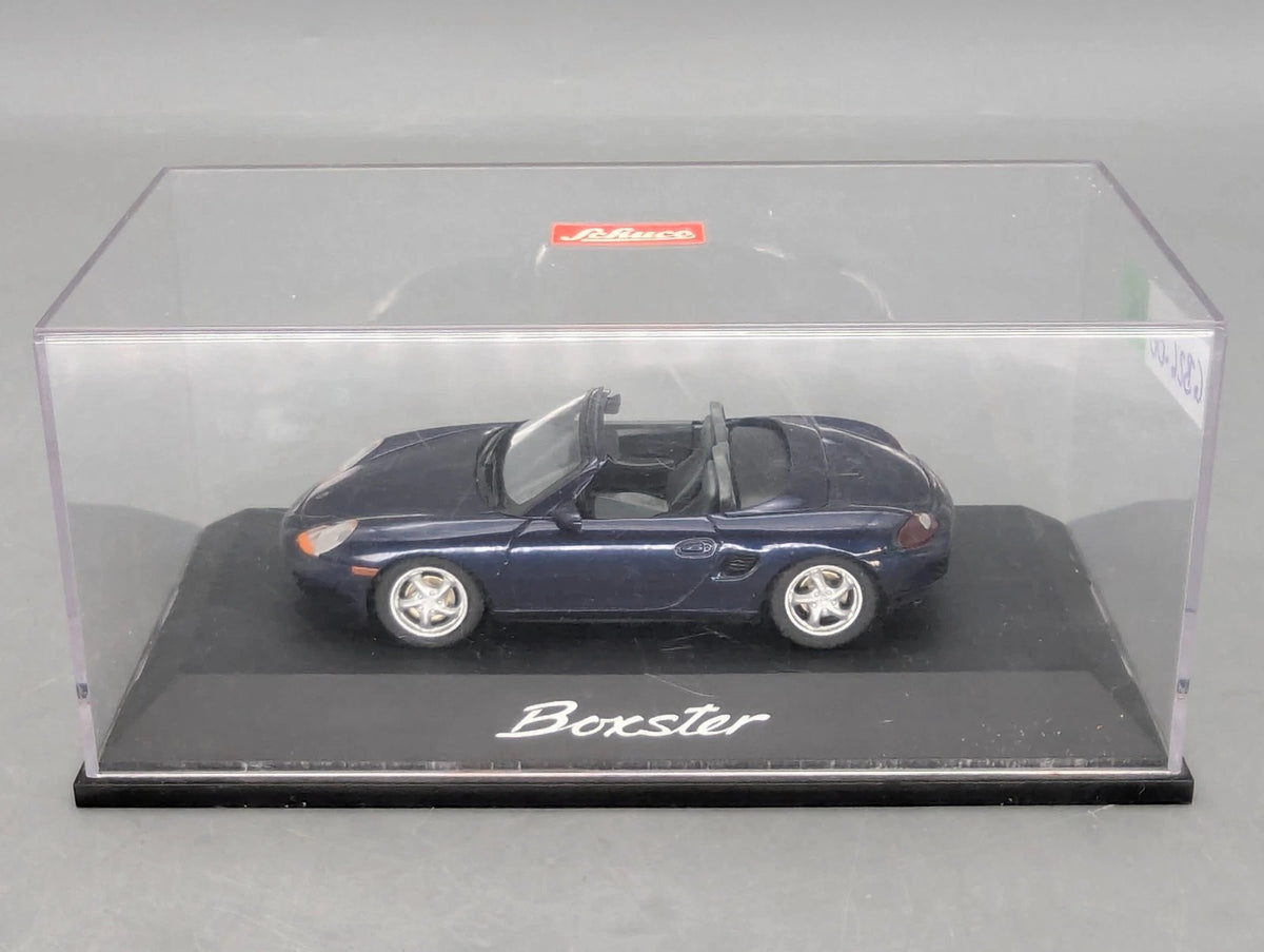Modellautos 1:43 Schuco Porsche Boxter Blau Metallic mit Vitrine