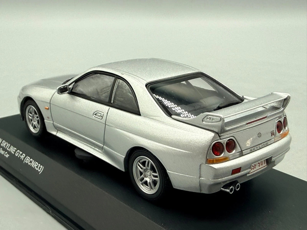 Modellautos 1:43 Kyosho Nissan Skyline GT-R (BCNR33) Test Car mit OVP