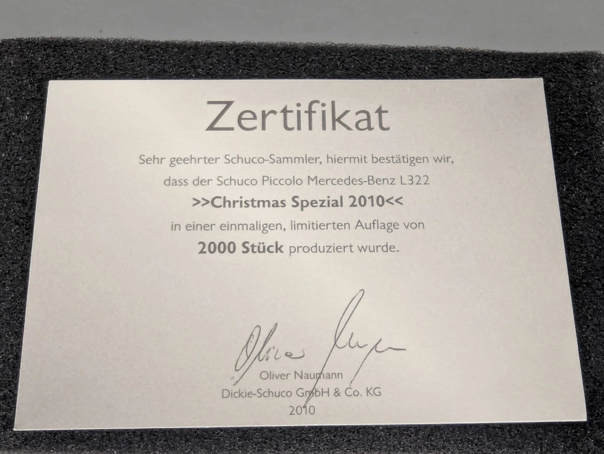 Modellautos 1:90 Schuco Piccolo Christmas Special Weihnachten 2010 MB LKW in OVP