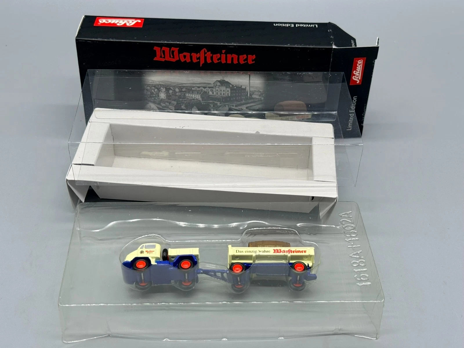 Modellautos 1:90 Schuco Piccolo 2er-Set Unimog + Anhänger Warsteiner in OVP
