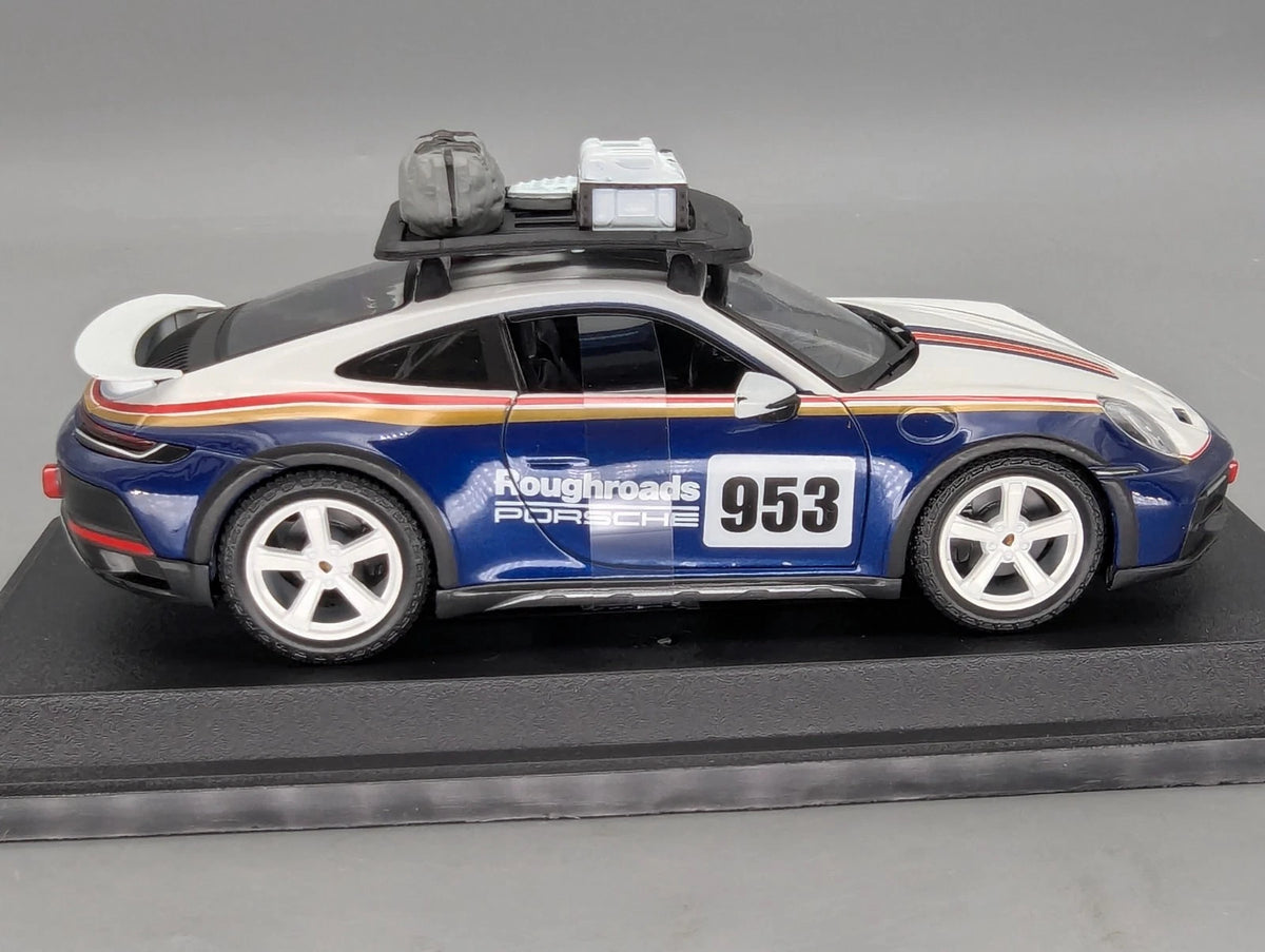 Modellautos 1:24 Bburago Porsche 911 Dakar mit Dealer OVP