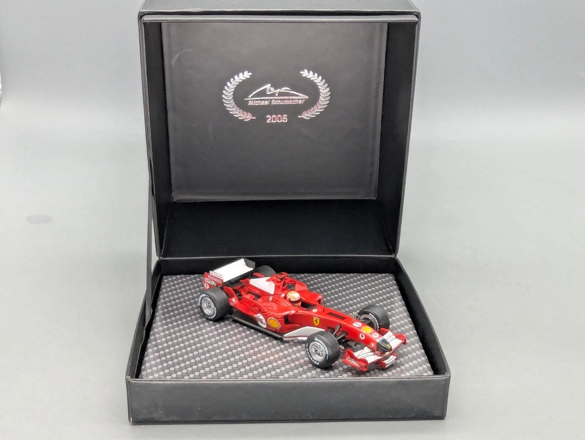 Modellautos 1:43 Ixo Ferrari F2005 #1 Michael Schumacher mit Klappbox OVP