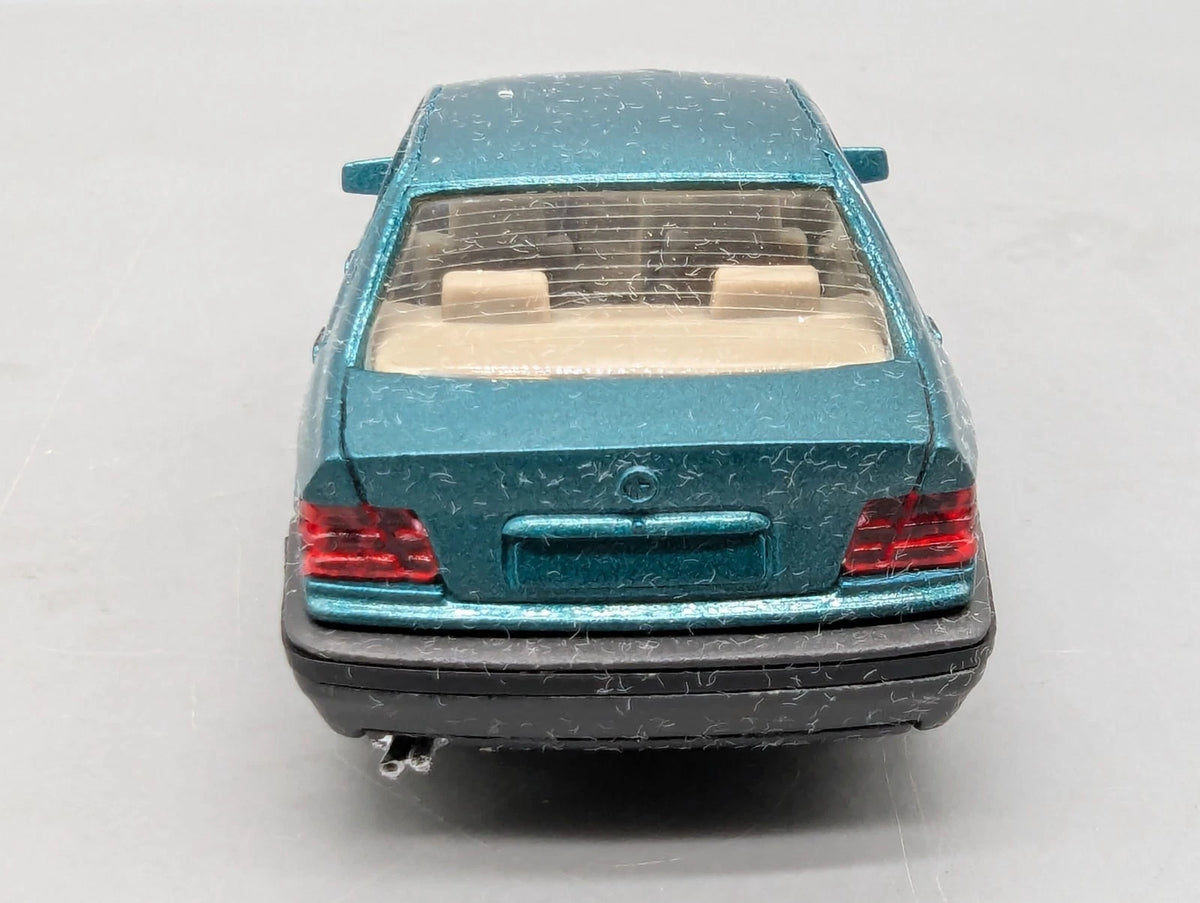 Modellautos 1:43 Solido BMW 325i mit Dealer OVP