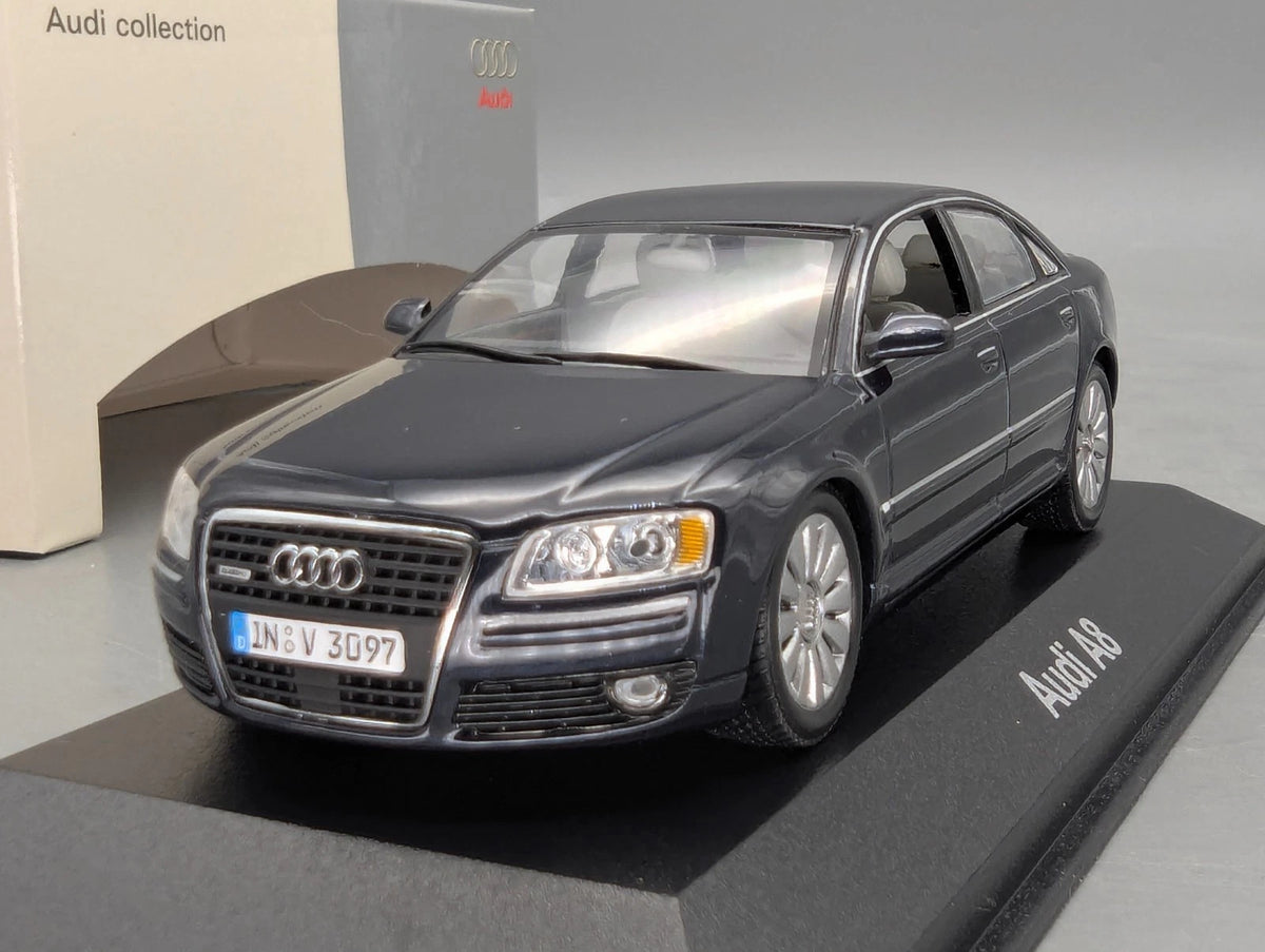 Modellautos 1:43 Minichamps Audi A8 Nachtblau mit Dealer OVP