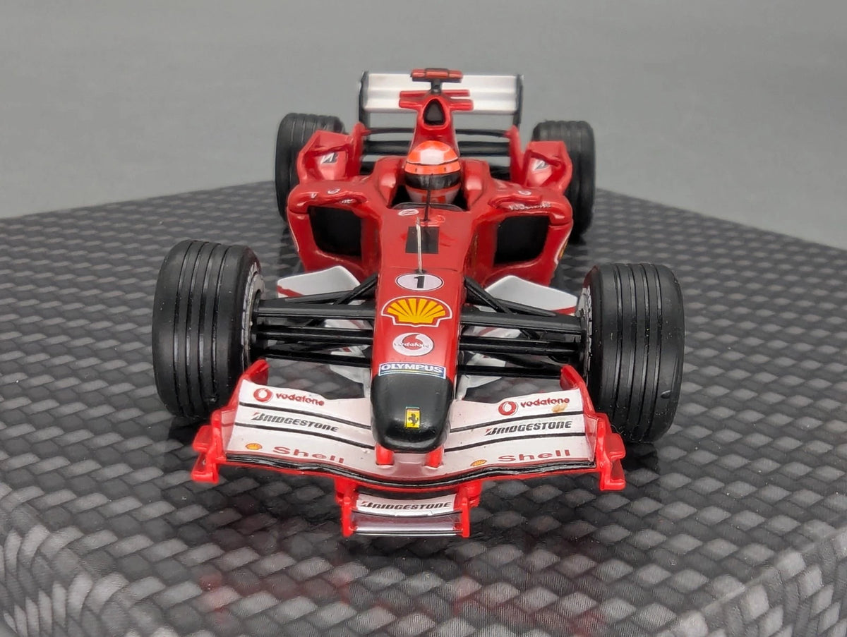 Modellautos 1:43 Ixo Ferrari F2005 #1 Michael Schumacher mit Klappbox OVP