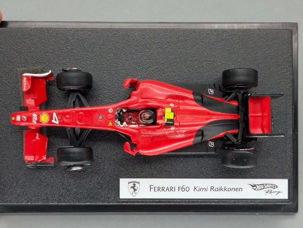 Modellautos 1:43 Hot Wheels Racing Ferrari F60 #4 Kimi Raikkönen mit OVP