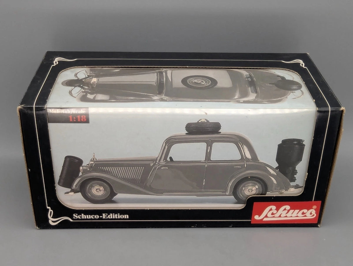 Modellautos 1:18 Schuco Mercedes Benz 170V Limousine mit Holzvergaser OVP