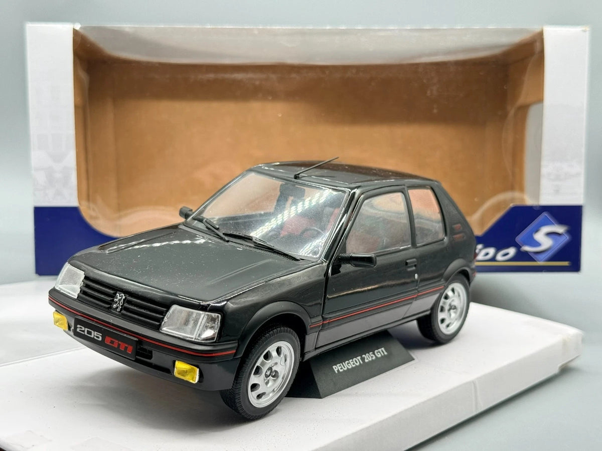 Modellautos 1:18 Solido Peugeot 205 GTI mit OVP