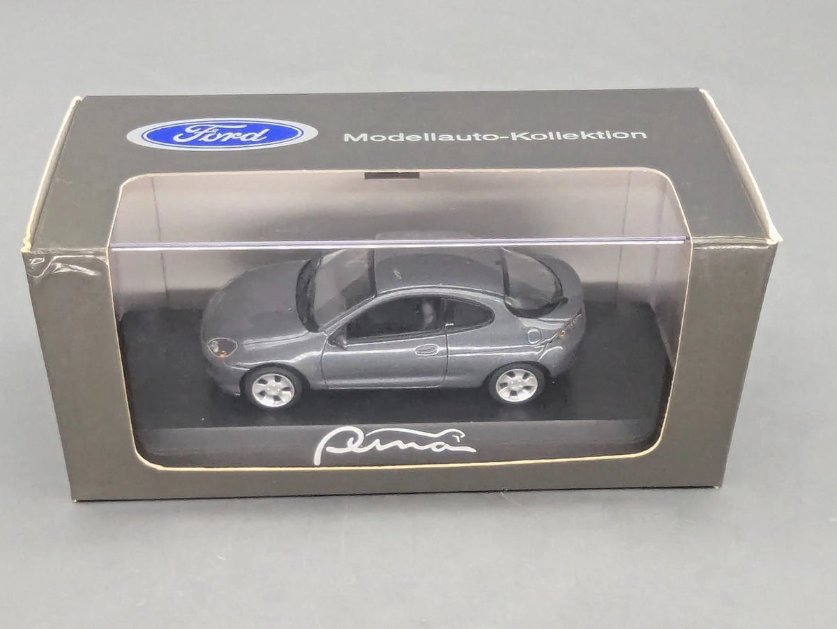 Modellautos 1:43 Minichamps Ford Puma Silbergrau Metallic mit Dealer OVP