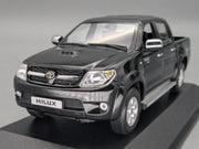 Modellautos 1:43 Minichamps Toyota Hillux Schwarz mit OVP