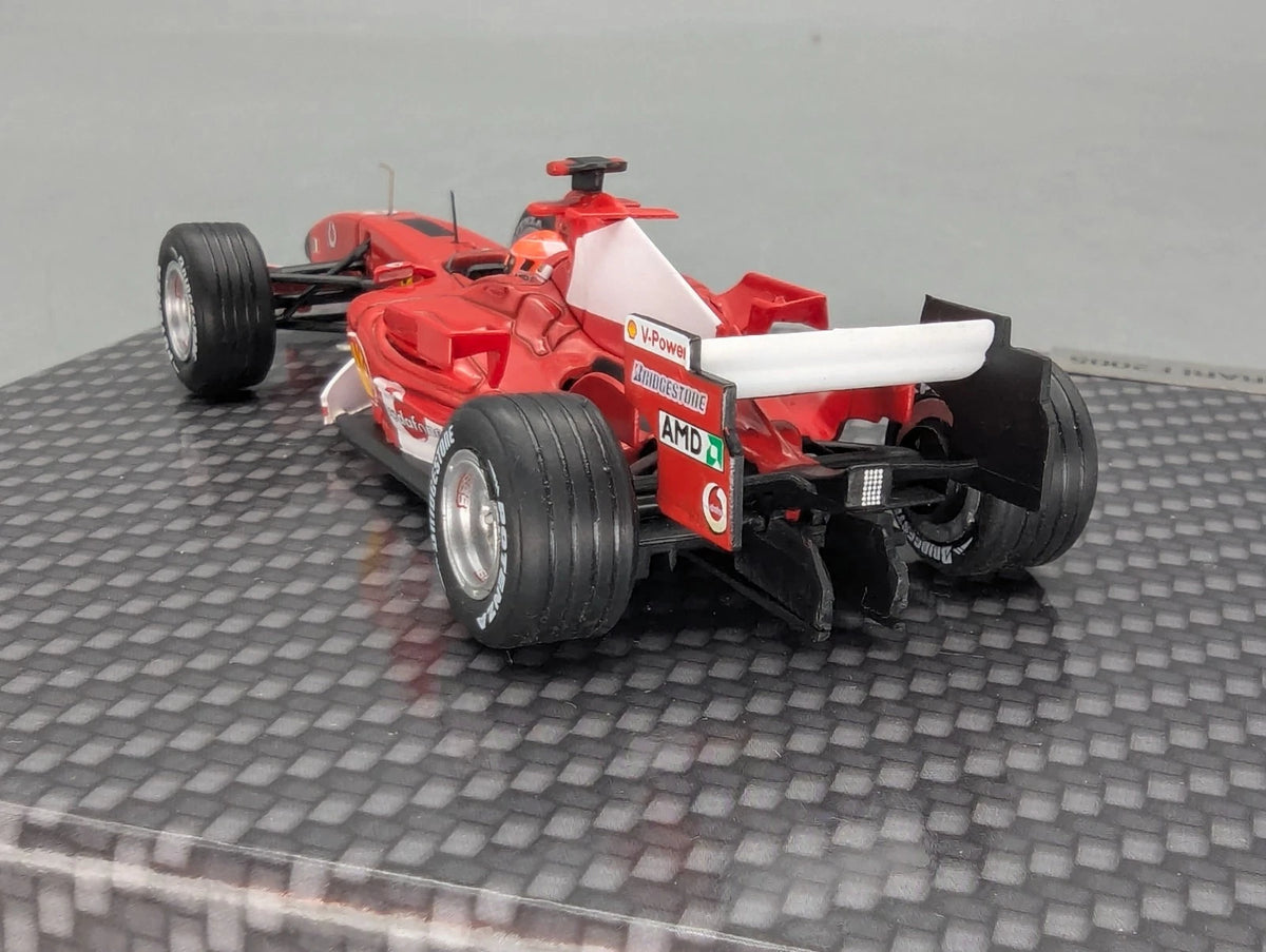 Modellautos 1:43 Ixo Ferrari F2005 #1 Michael Schumacher mit Klappbox OVP