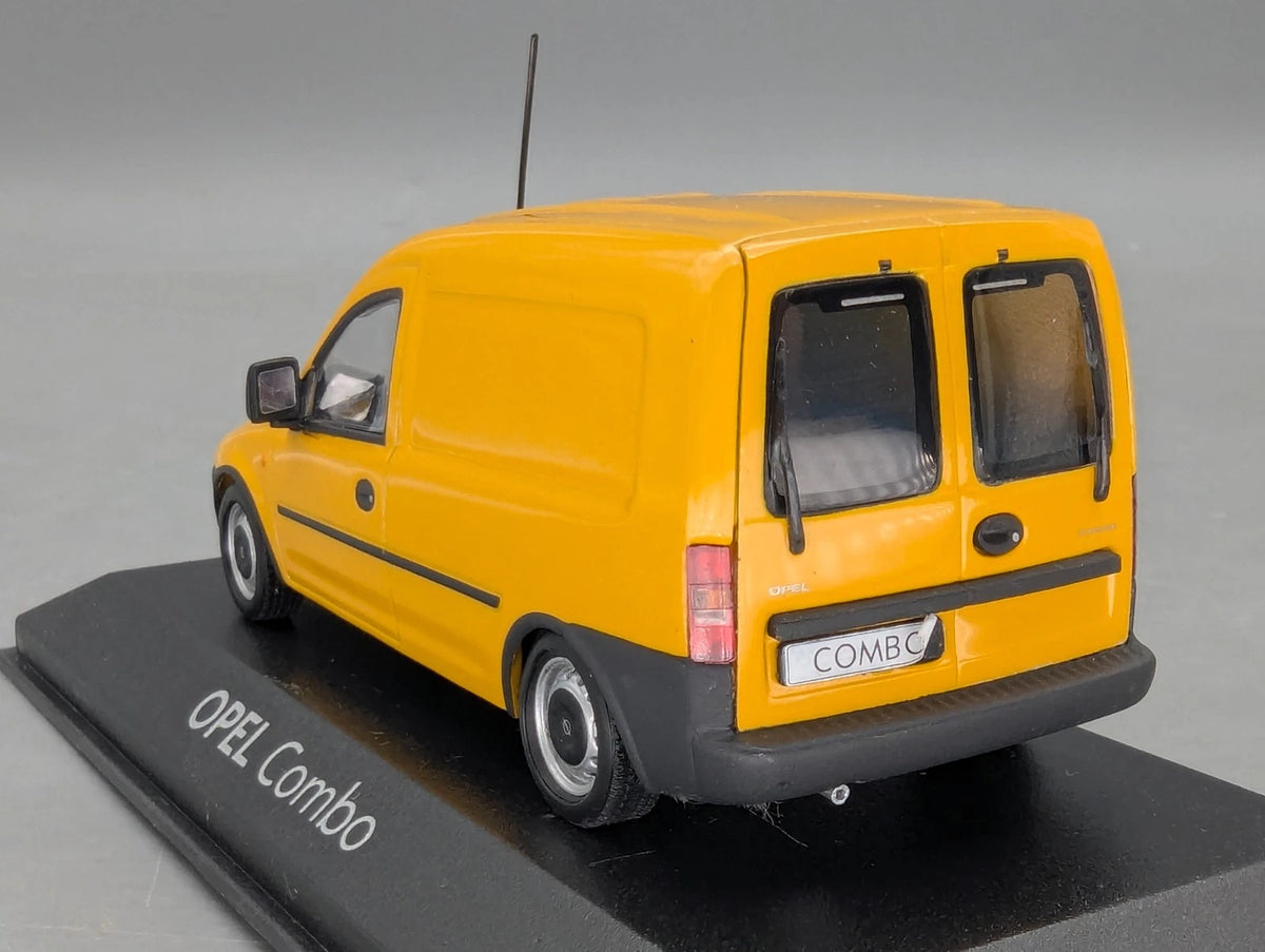 Modellautos 1:43 Minichamps Opel Combo gelb mit Dealer OVP