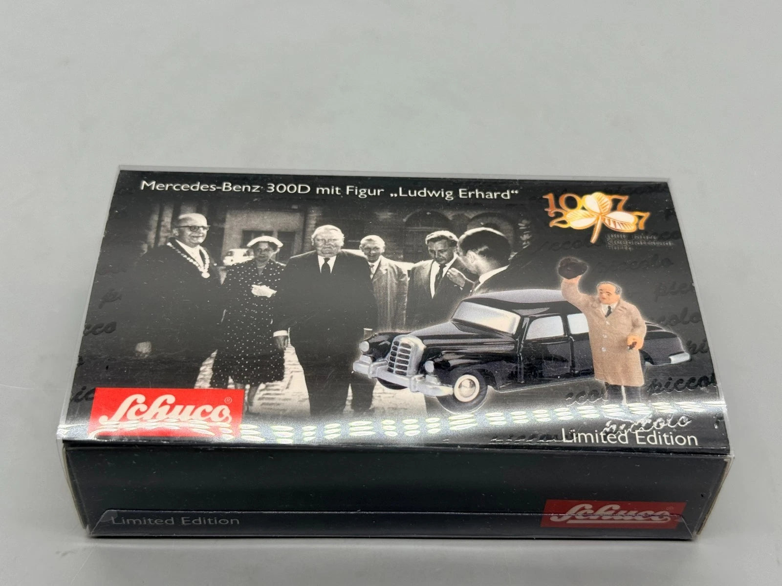 Modellautos 1:90 Schuco Piccolo-2er Set Mercedes-Benz 300D mit Figur in OVP