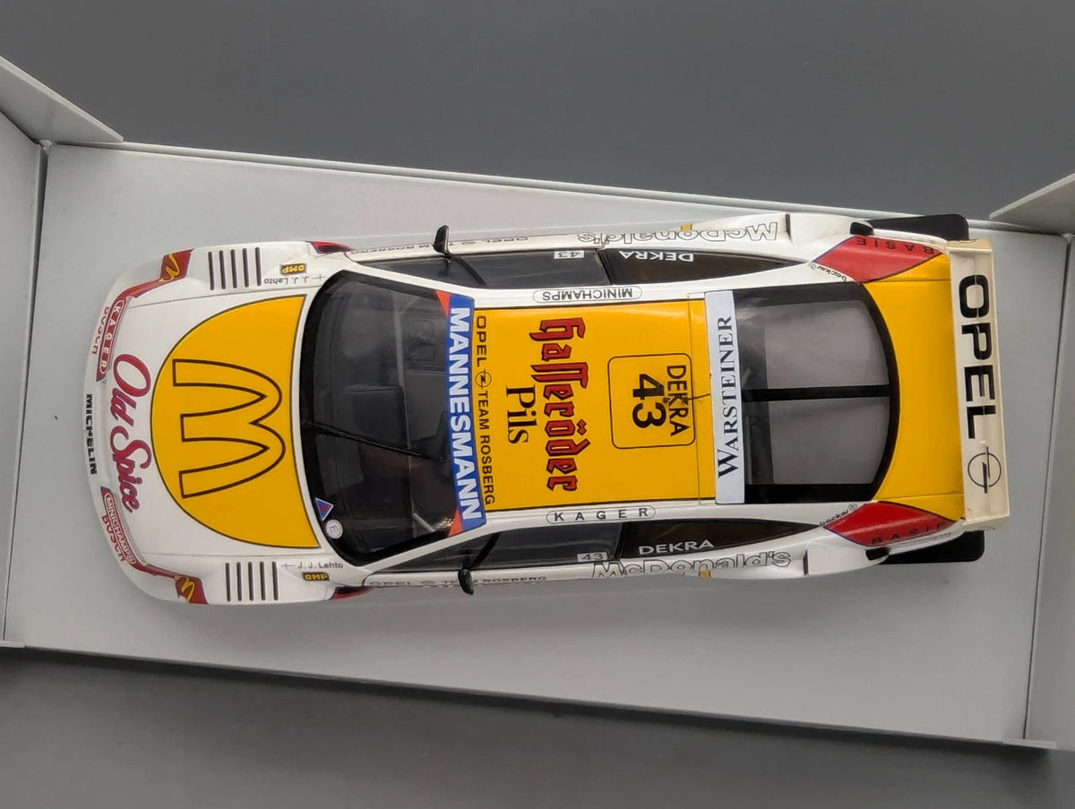 Modellautos 1:18 UT Models Opel Calibra Rosberg 1996 J. J. Letho in OVP