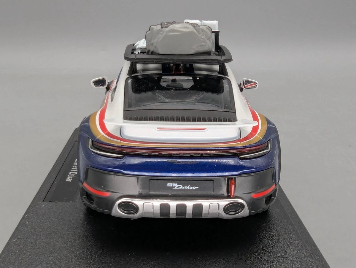 Modellautos 1:24 Bburago Porsche 911 Dakar mit Dealer OVP