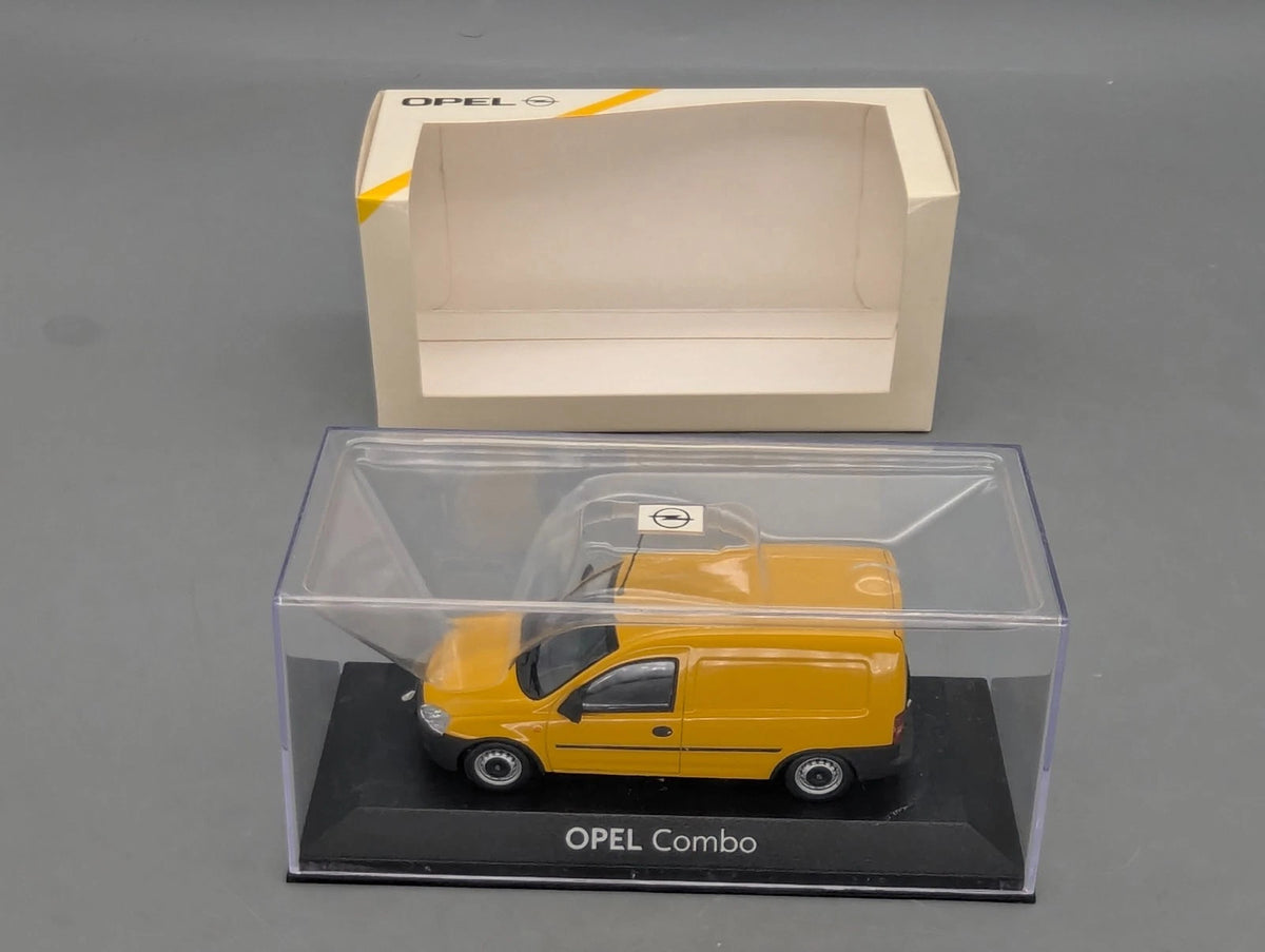 Modellautos 1:43 Minichamps Opel Combo gelb mit Dealer OVP