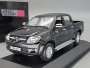 Modellautos 1:43 Minichamps Toyota Hillux Schwarz mit OVP