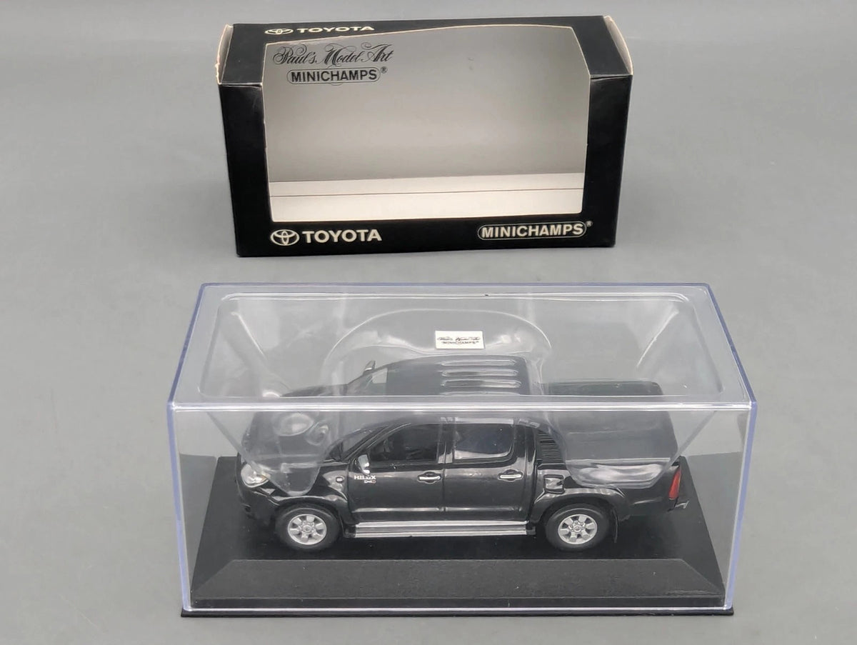 Modellautos 1:43 Minichamps Toyota Hillux Schwarz mit OVP