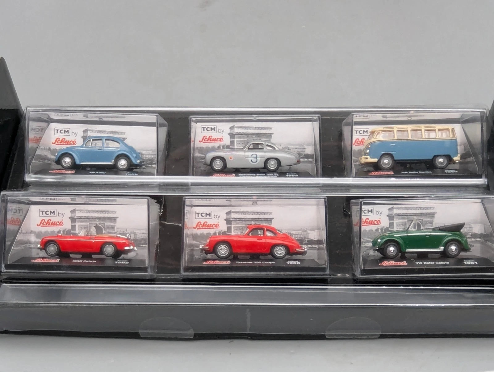 Modellautos 1:72 Schuco Tchibo 6-teiliges Set mit Vitrinen und OVP