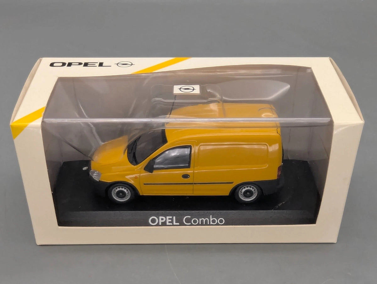 Modellautos 1:43 Minichamps Opel Combo gelb mit Dealer OVP