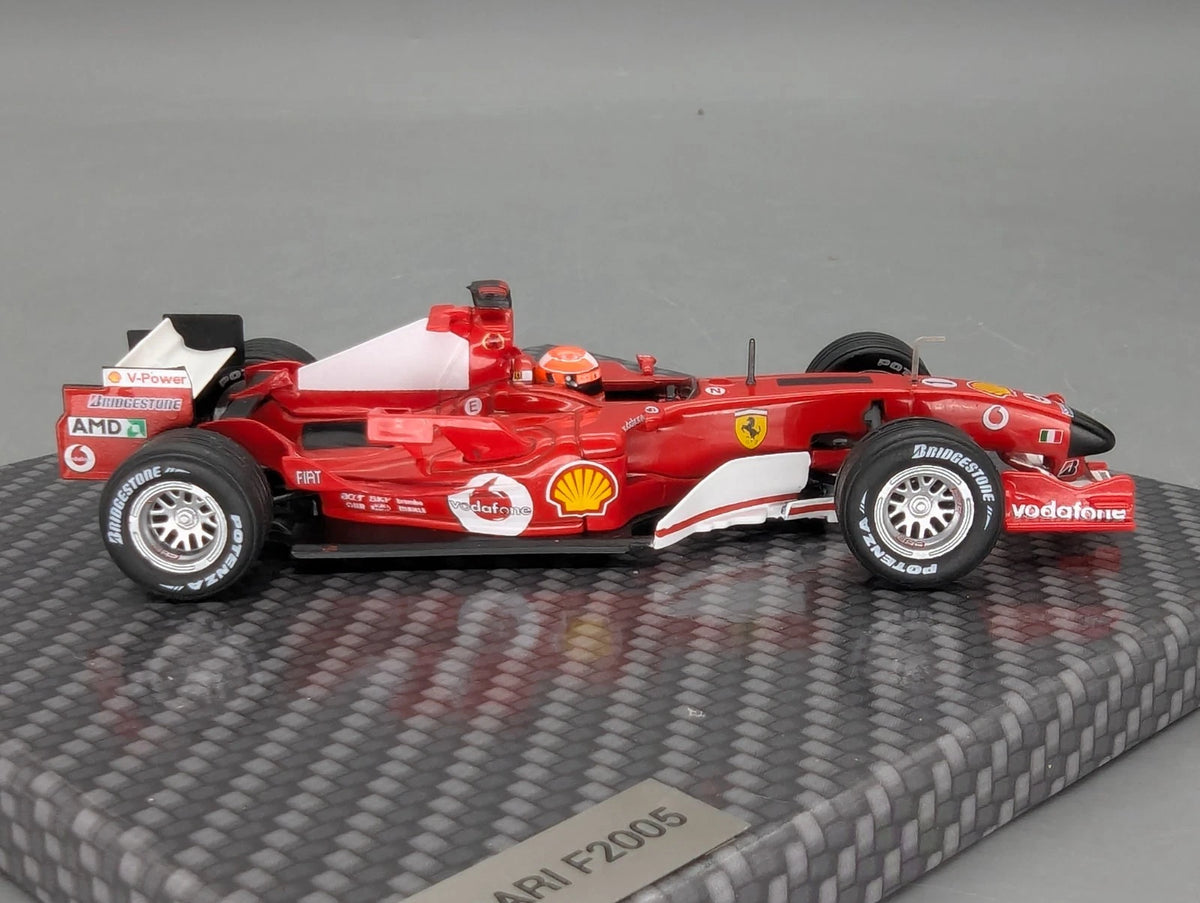 Modellautos 1:43 Ixo Ferrari F2005 #1 Michael Schumacher mit Klappbox OVP