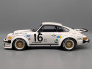 Modellautos 1:12 Minichamps Porsche 934 RSR Turbo WINNER 76 #16. Follmer Vitrine